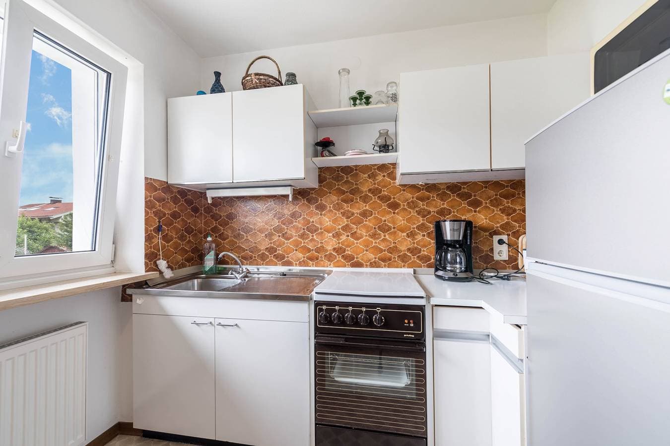 Foto 5 von 15: Gemütliche Ferienwohnung Ferienhaus "Schild" mit Garten & Bergblick