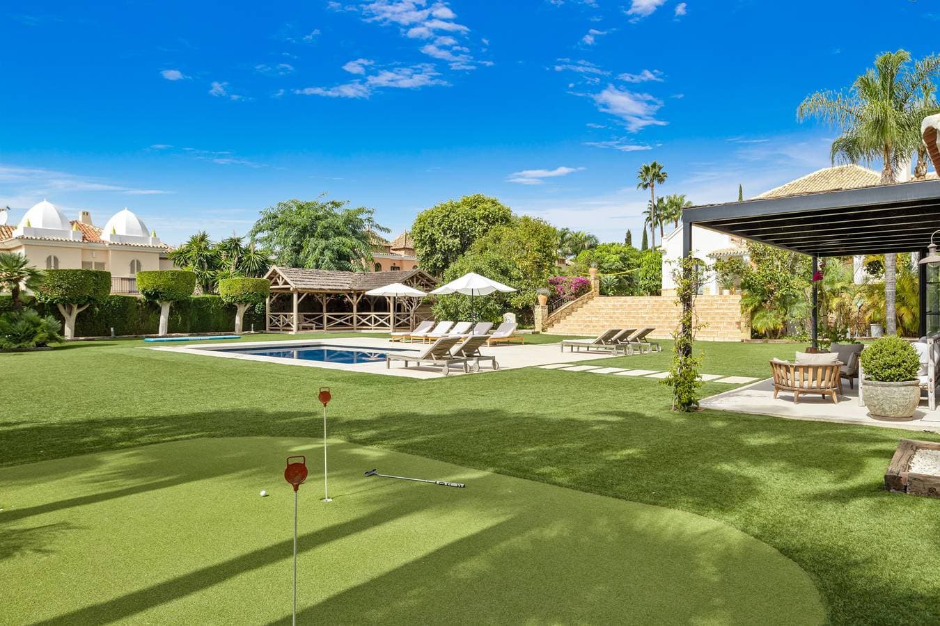 Foto 7 von 46: Villa Paraiso - Gym | Putting Green | Heated Pool