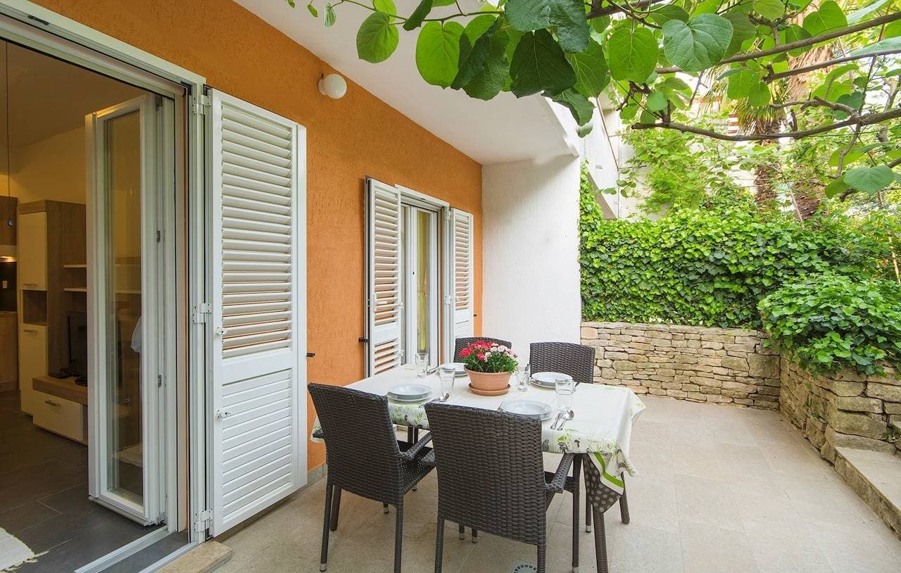 Foto 4 von 29: Apartment Majic mit Terrasse und Garten
