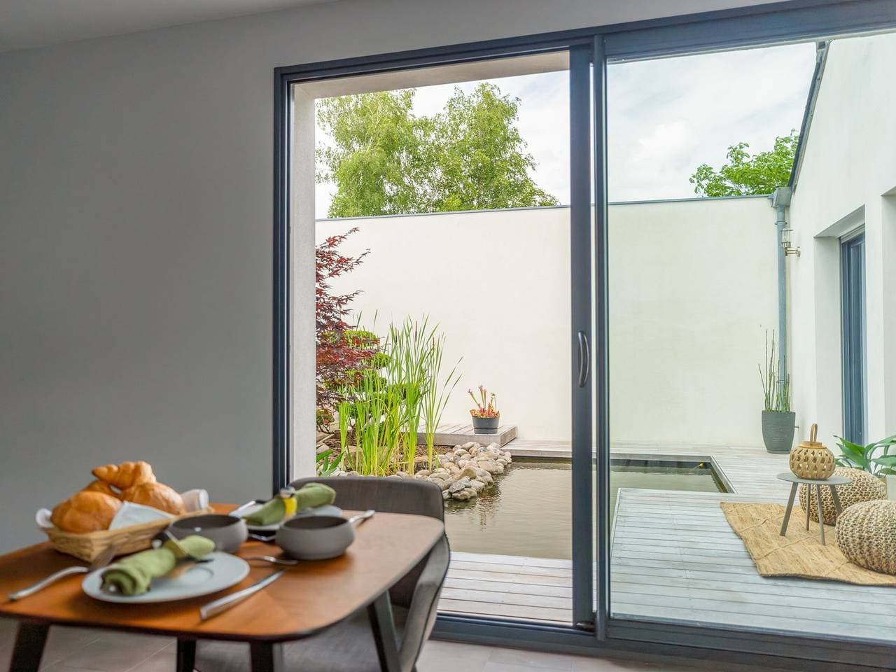 Foto 10 von 21: Erdgeschosszimmer mit Terrasse
