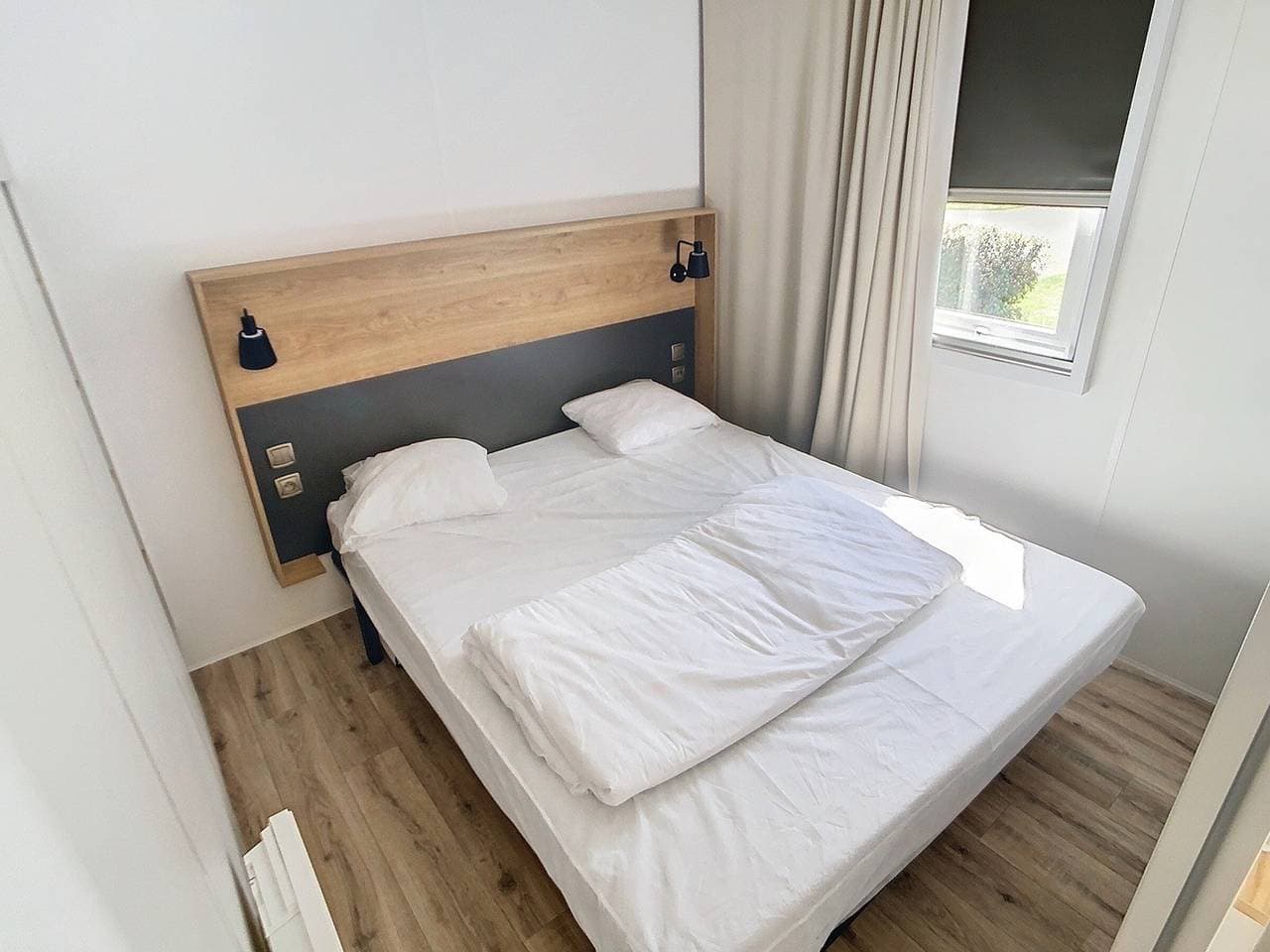 Foto 6 von 18: Mobil-Home Grand Confort à 200m de la Plage avec Piscine, 4 Pers, 2 Ch, Parking, Wifi Inlcus