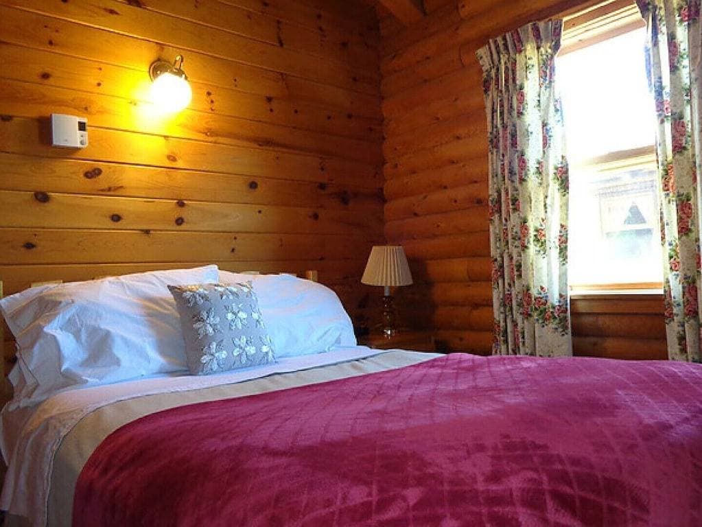 Foto 11 von 34: Cajun Cedar Log Cottages 1 Zim. - Kap-Breton-Einheit 3