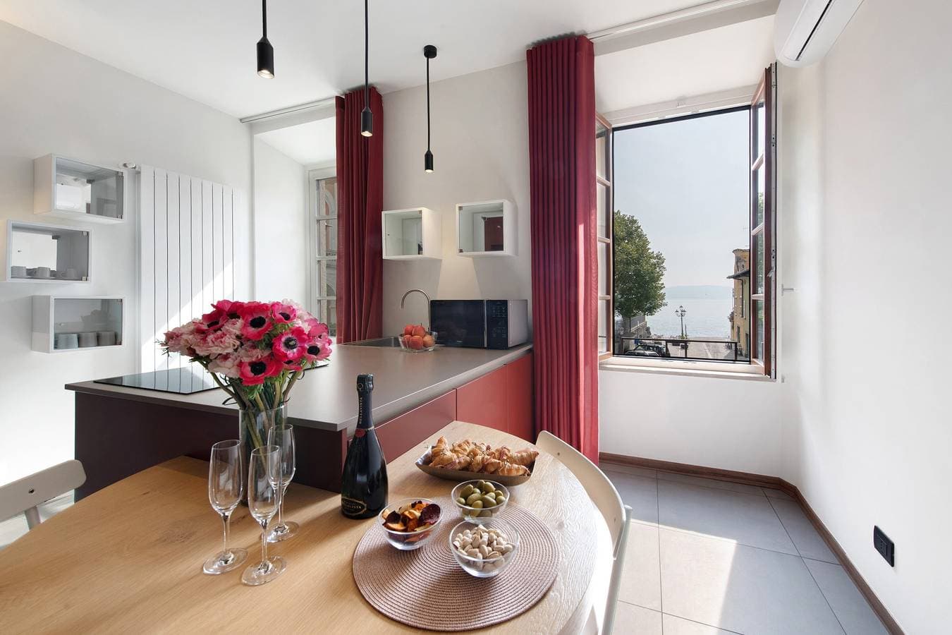 Foto 5 von 35: Apartment „Gemhouse Rubino“ mit Seeblick, WLAN und Klimaanlage