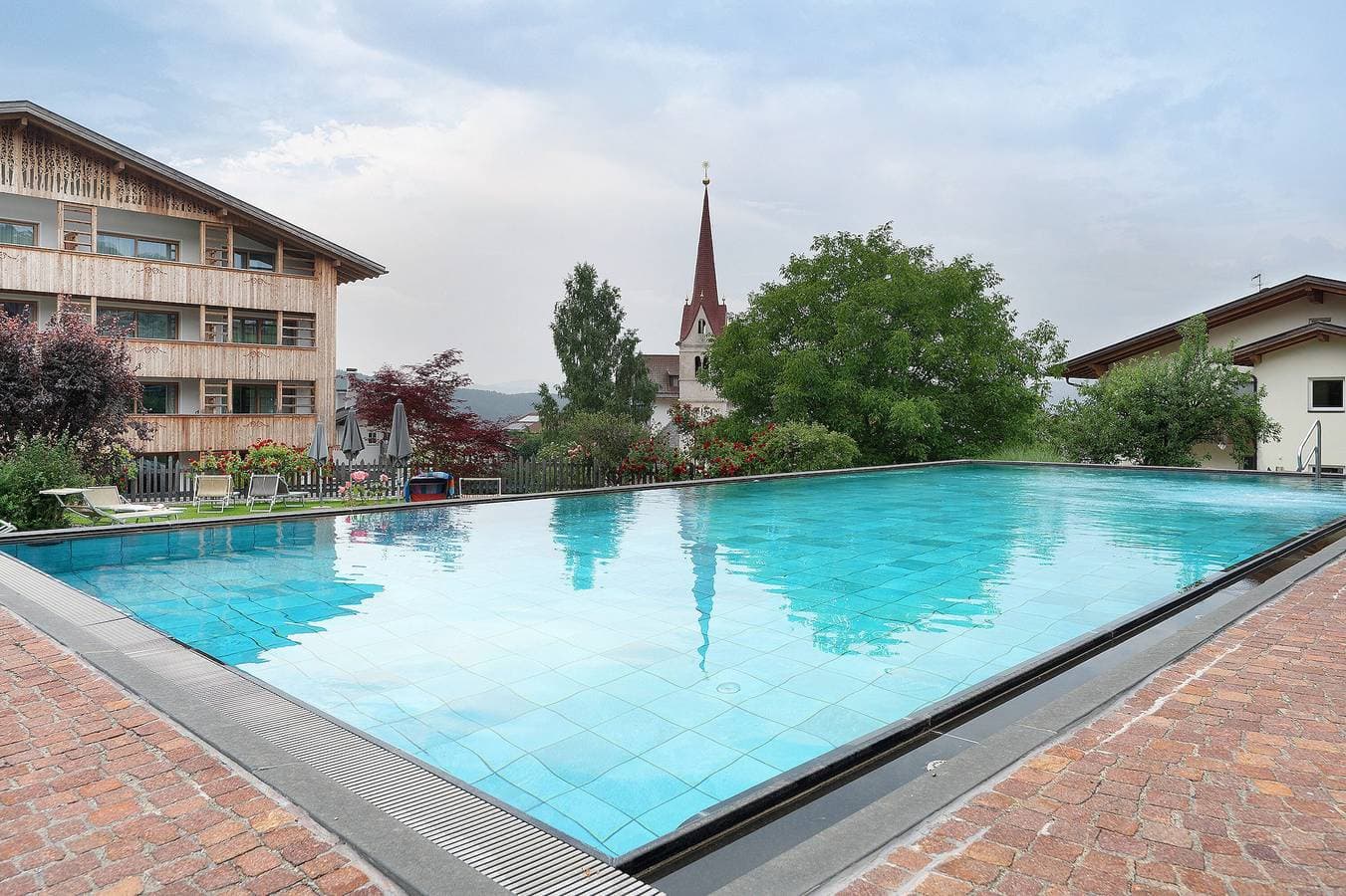 Foto 5 von 34: Ferienwohnung 'Residenz Nussbaumer Apt B' mit Bergblick, Gemeinschaftspool und Wi-Fi