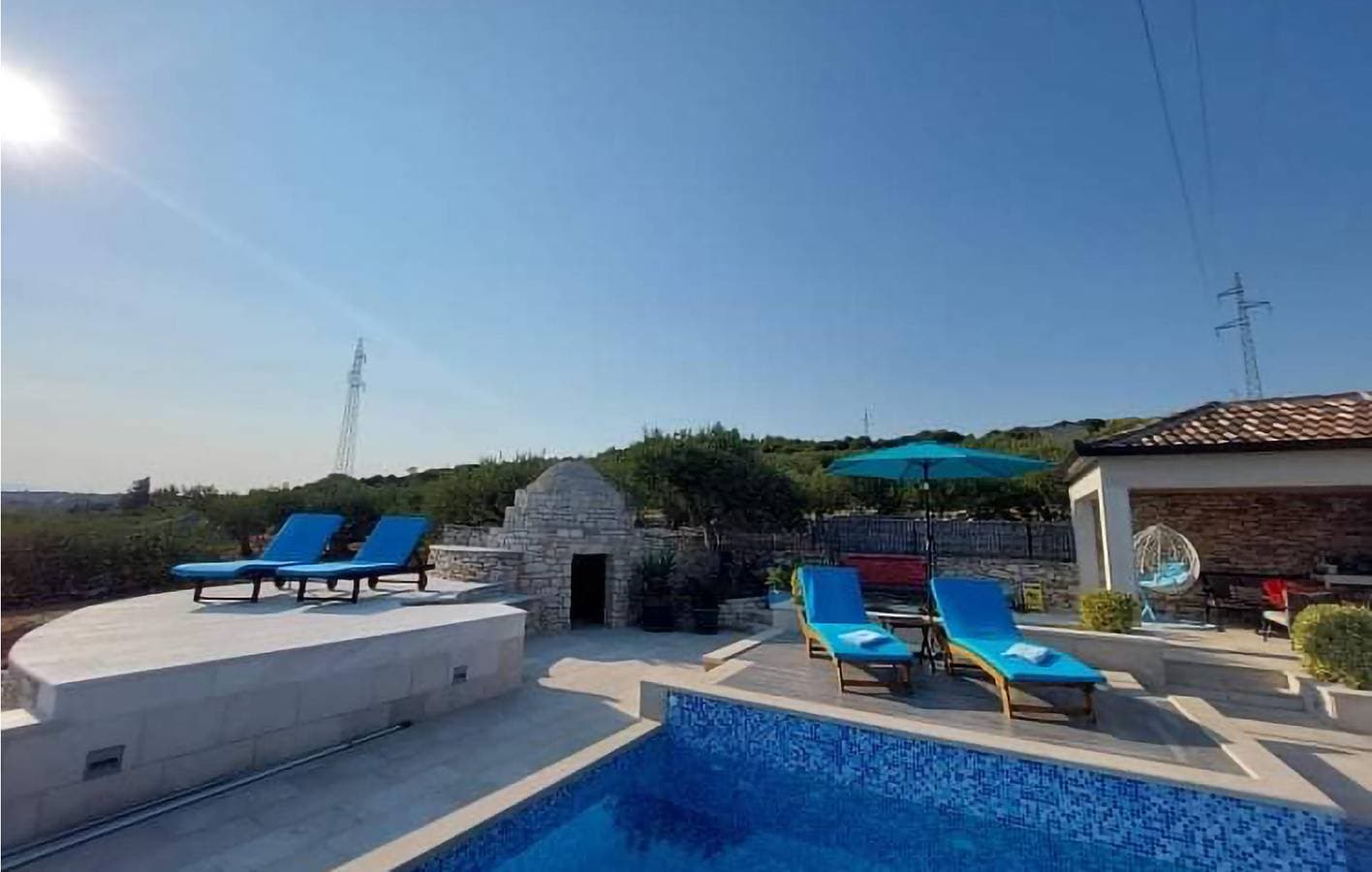 Foto 9 von 40: Gemütliche 75 m² große Ferienwohnung mit Pool, Terrasse und WLAN – 1 km vom Strand entfernt
