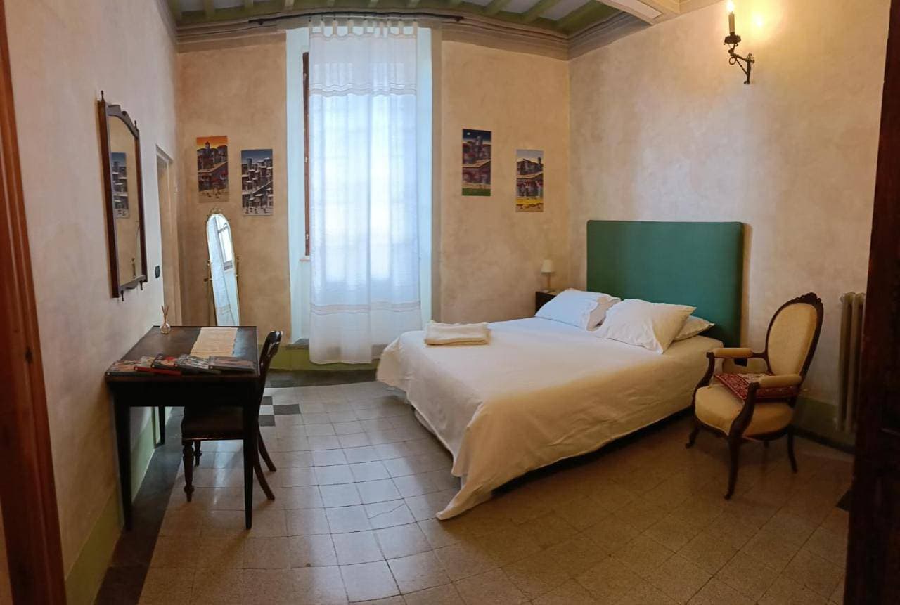 Foto 11 von 12: Triple Room with Private Bathroom