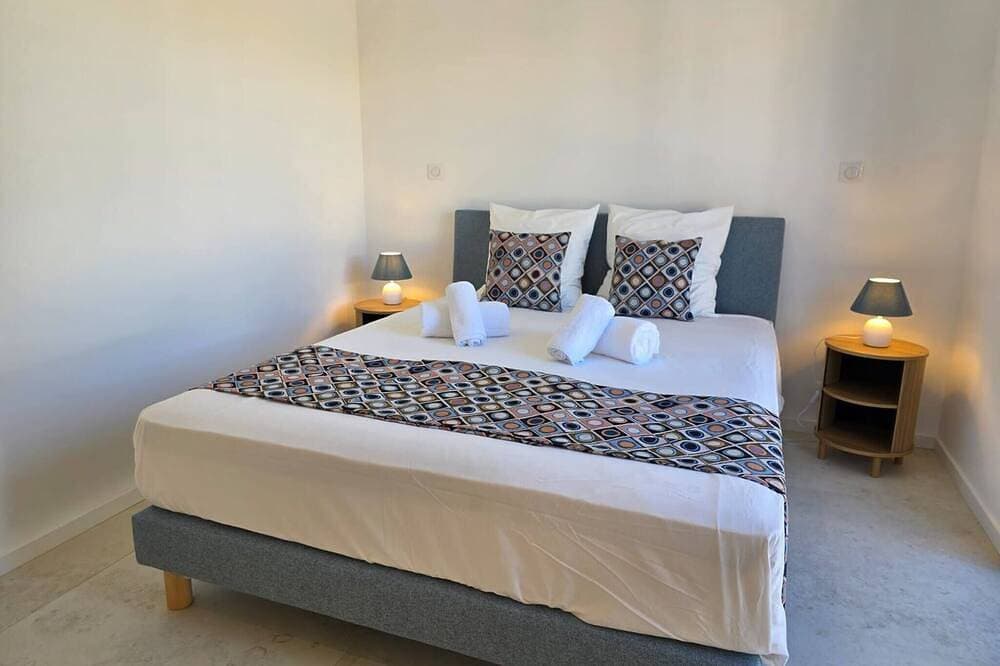 Foto 4 von 20: Under the Palm Tree - Beach - Air Conditioning - Garden