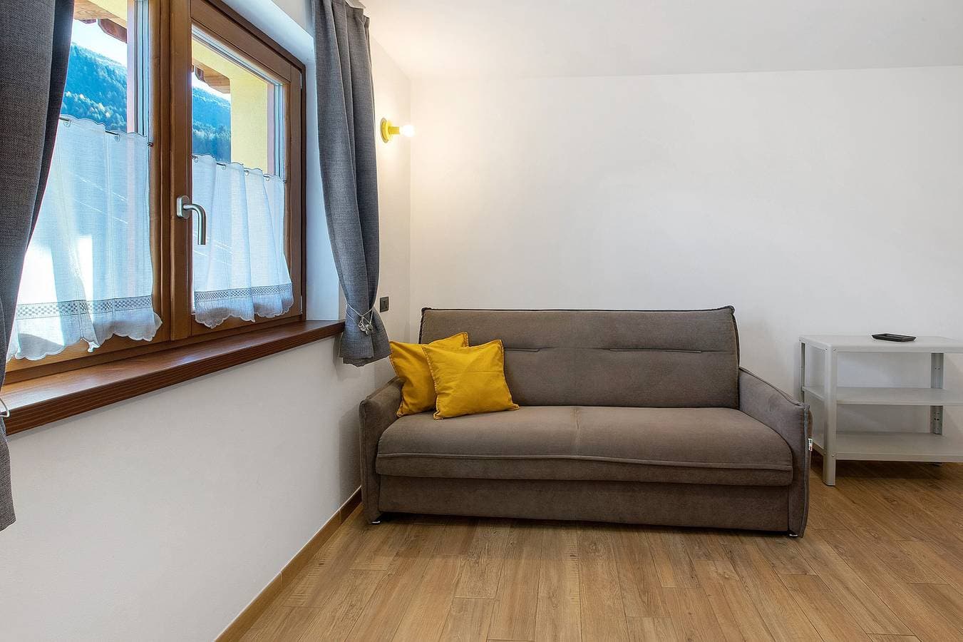 Foto 6 von 24: Apartment '1' mit Bergblick, Gemeinschaftsterrasse und WLAN