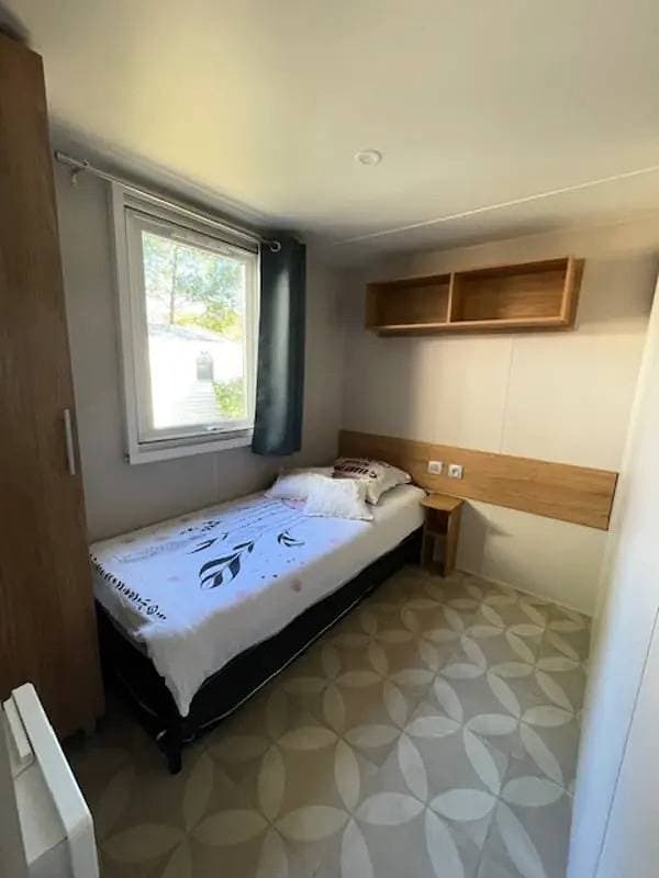 Foto 12 von 15: Mobilhome 3 chambres Camping Les Dunes de Contis