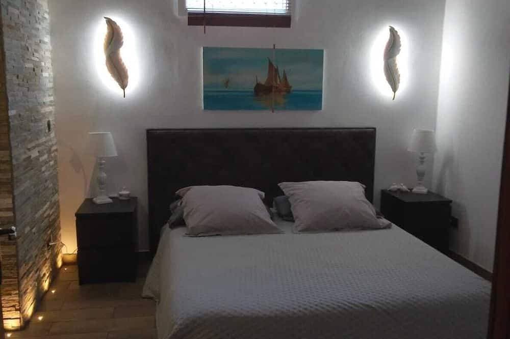 Foto 2 von 29: Suite-style room with a pool