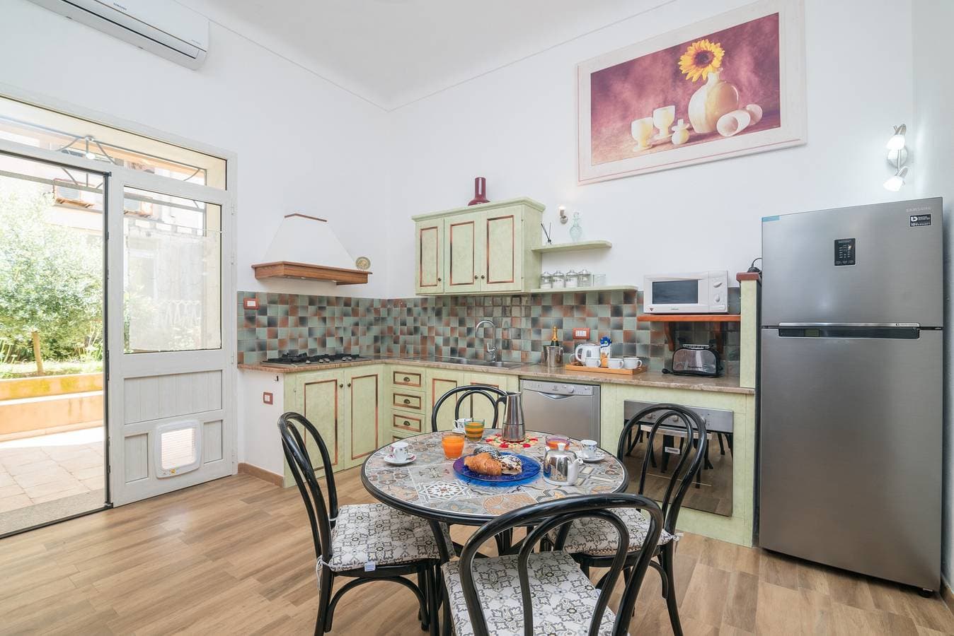 Foto 7 von 25: Ferienhaus 'Maison Chloe' in Strandnähe mit Terrasse, Garten und WLAN