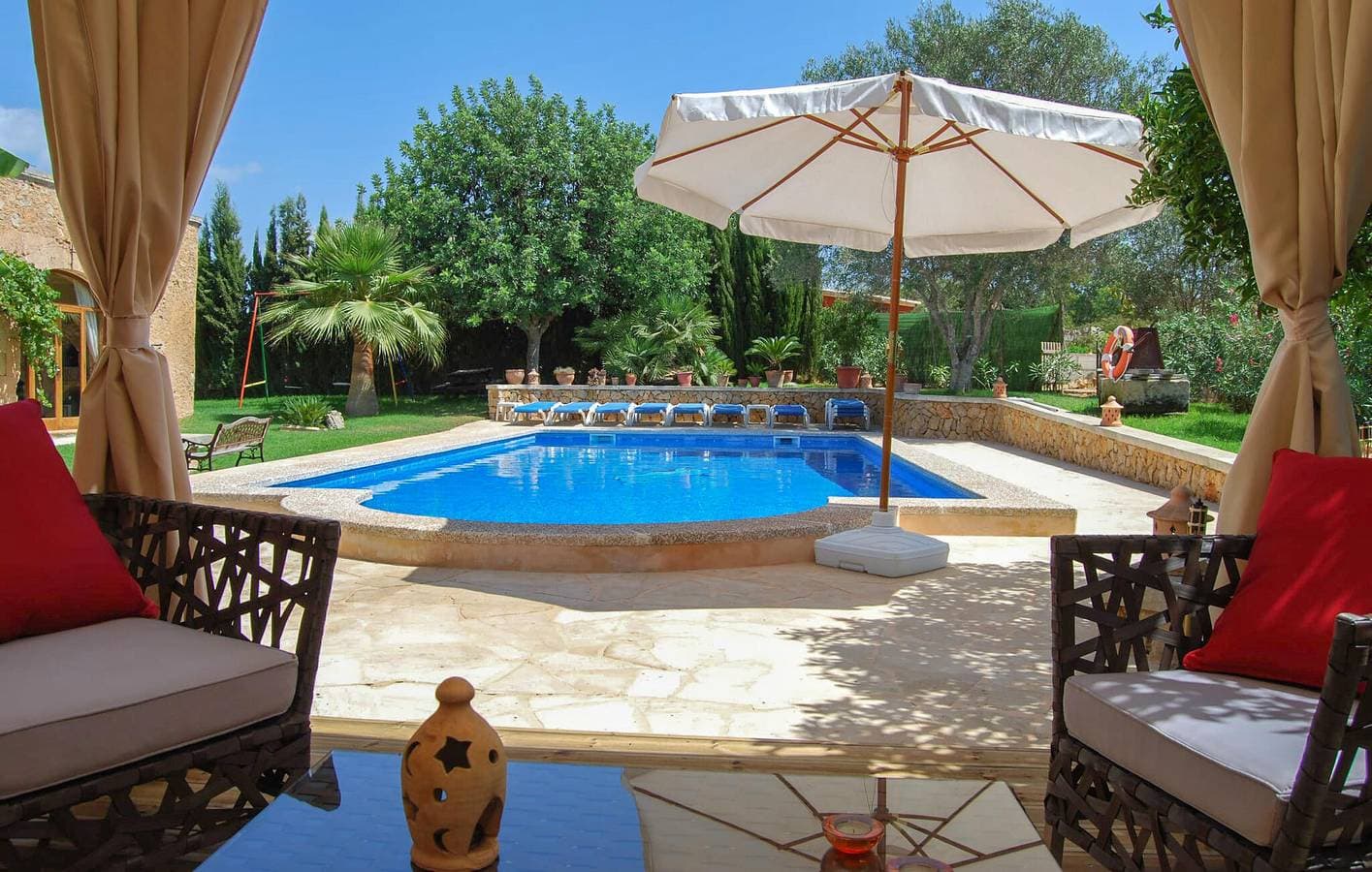 Foto 10 von 38: Gemütliche Wohnung mit Pool und Terrasse bei Es Carritxó