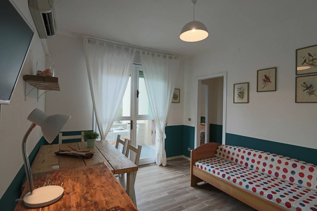 Foto 5 von 25: Ferienwohnung mit Klimaanlage und Balkon