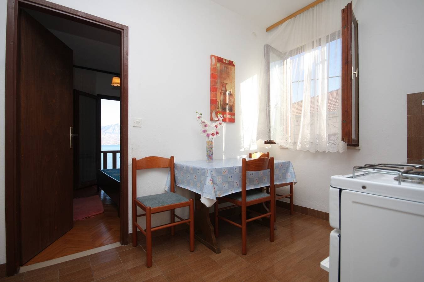 Foto 13 von 28: One bedroom apartment with balcony and sea view Postira, Brač -b