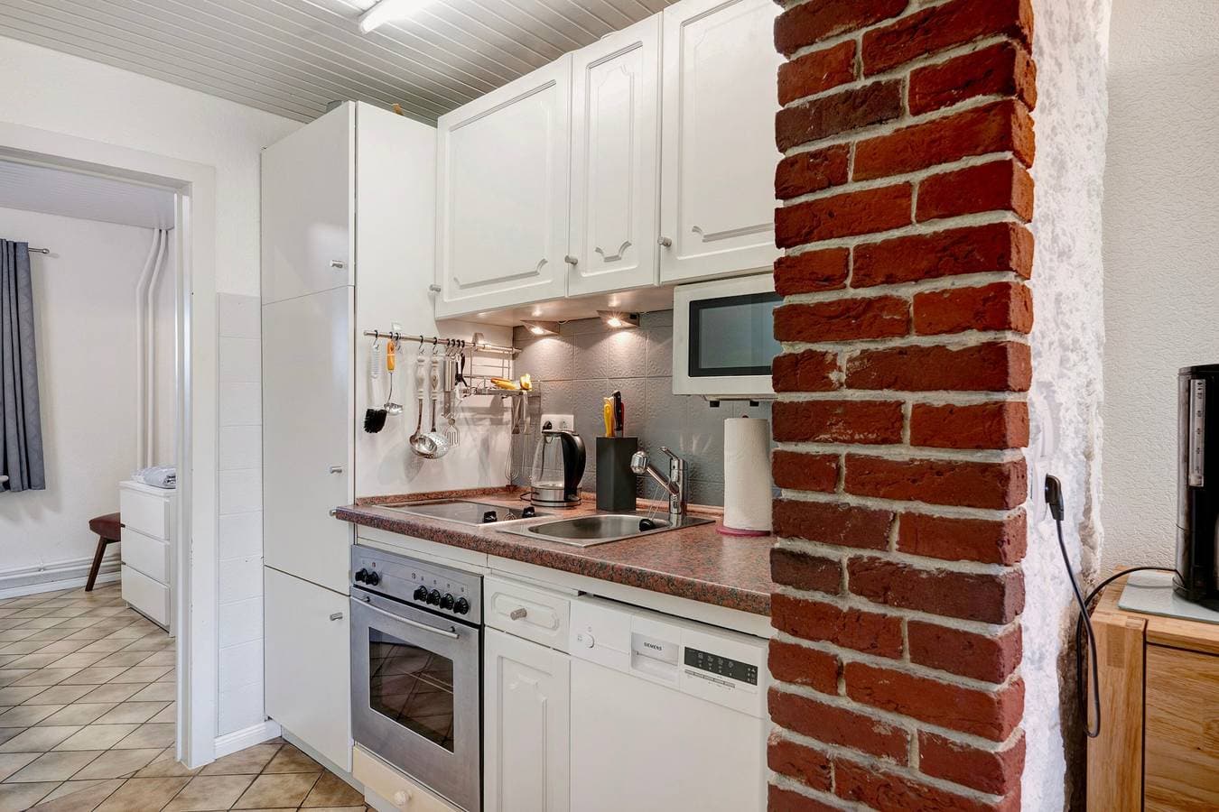 Foto 11 von 25: Ferienwohnung 'Haus Lith Deichblick' mit Meerblick, privater Terrasse und Wi-Fi
