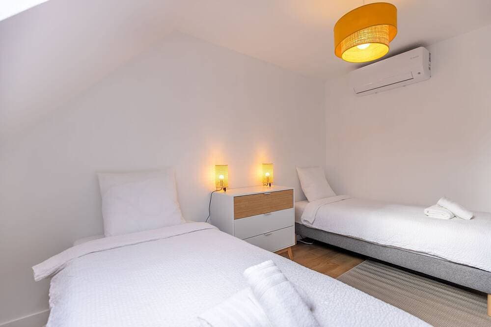 Foto 6 von 15: Apartment-Ensuite mit Dusche-Climatisation-Stadtblick
