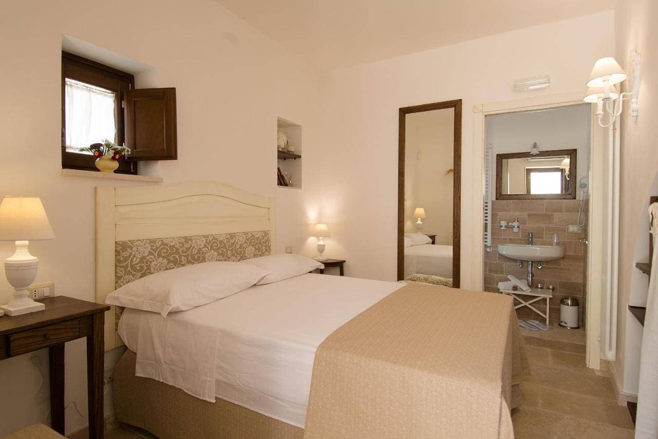 Foto 10 von 12: Double Room with Private Bathroom