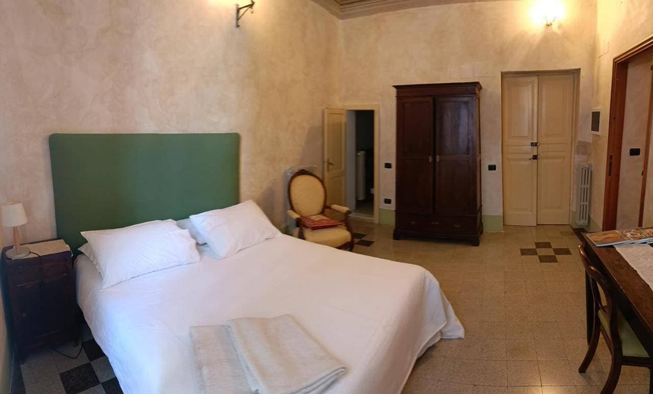 Foto 12 von 12: Triple Room with Private Bathroom