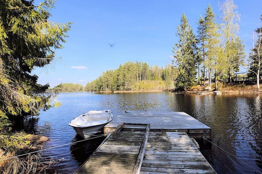 Foto 13 von 22: Ferienhaus Tived - direkt am See, Sauna, Boot, Badezuber