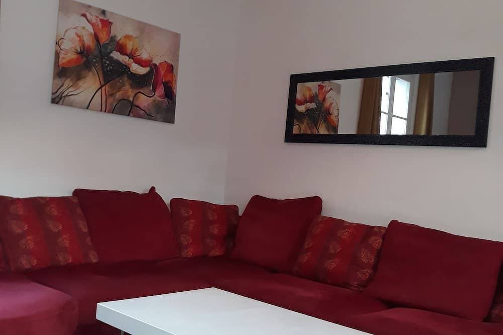 Foto 6 von 12: L'escale Arquaise, Das Haus mit einem Blumengarten
