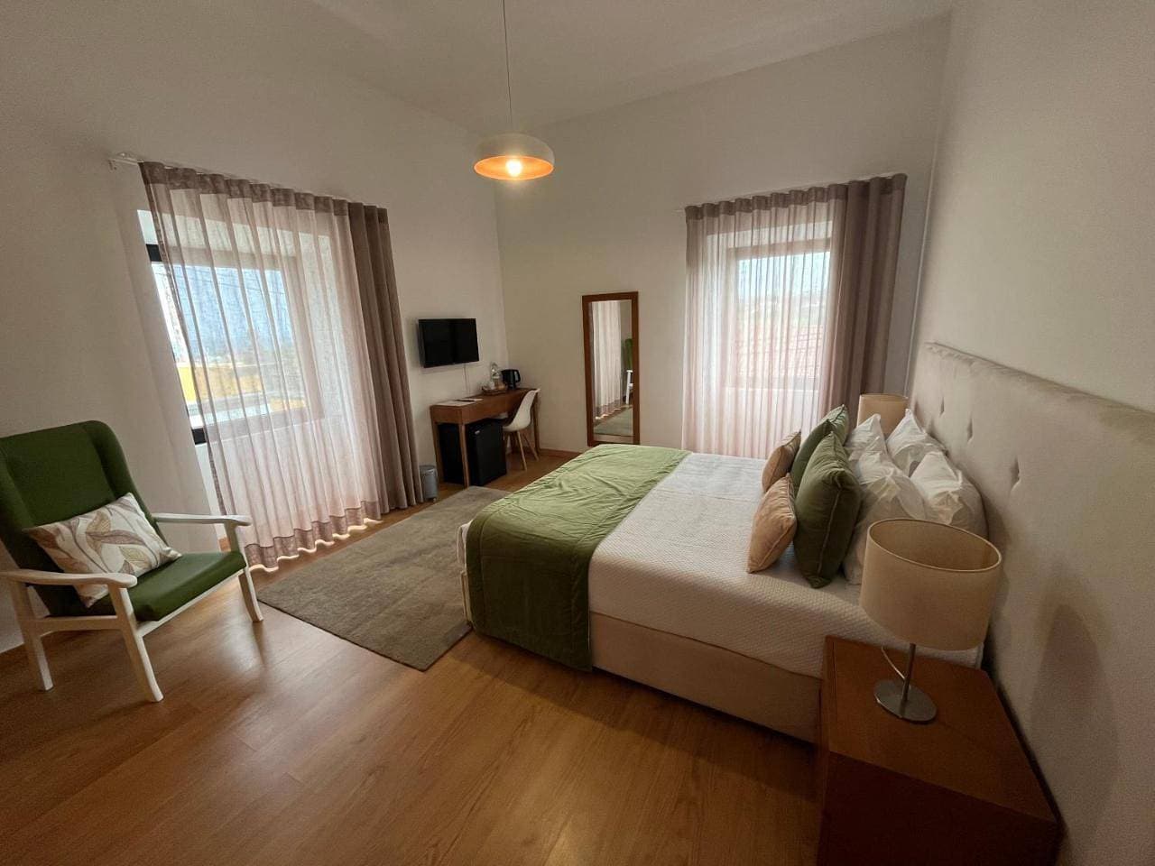 Foto 10 von 12: Double Room with Shared Bathroom