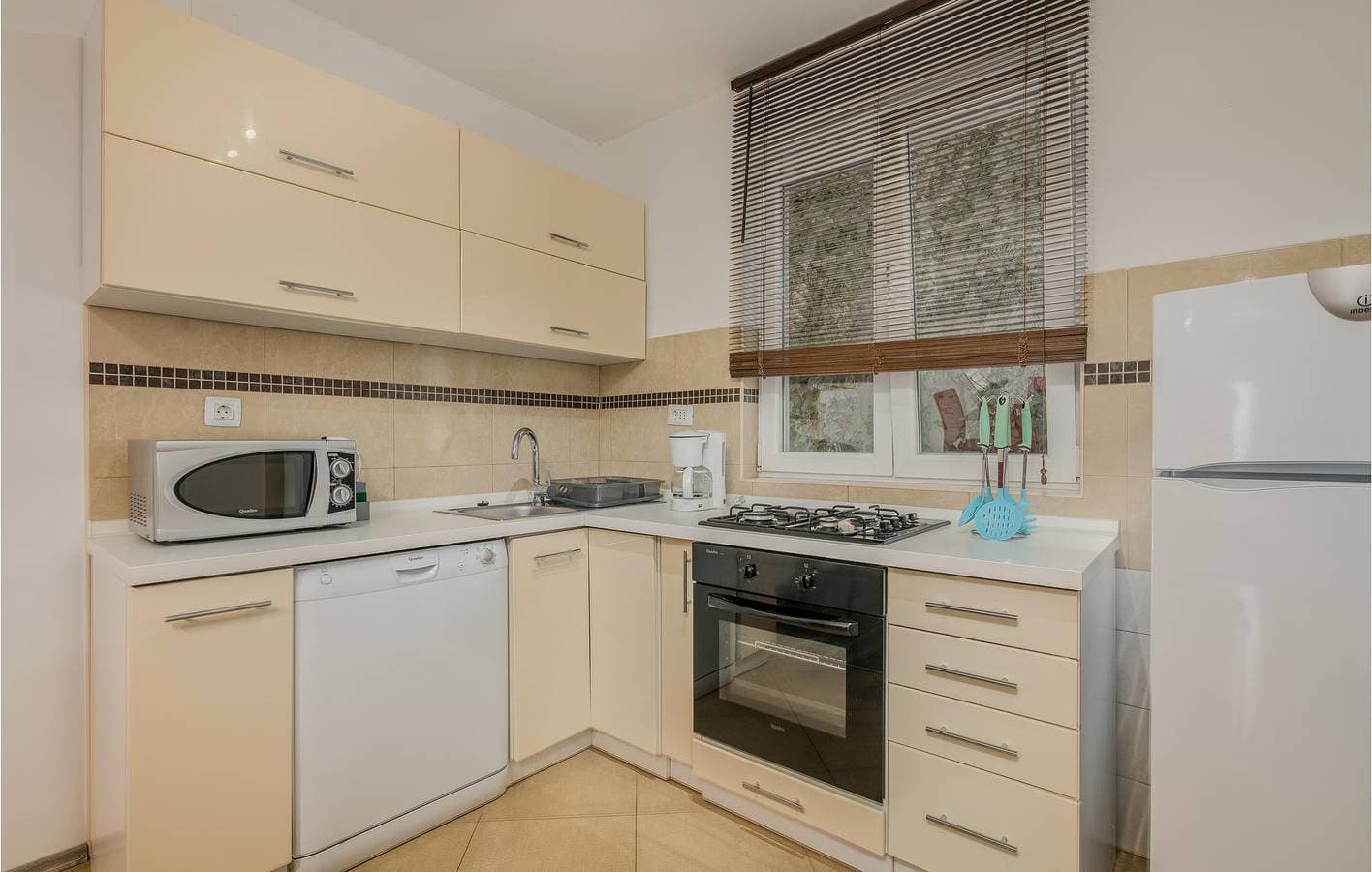 Foto 8 von 21: Gemütliche Ferienwohnung mit Terrasse, nur wenige Schritte vom ruhigen Strand und erstklassigen Annehmlichkeiten entfernt
