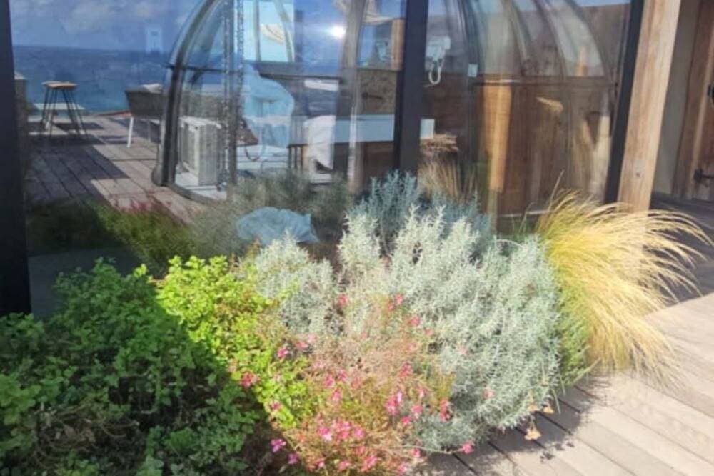 Foto 13 von 30: Kuppel-Deluxe-Ensuite mit Dusche-Blick auf die Bucht