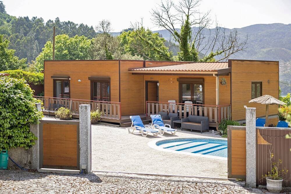 Foto 11 von 26: Ferienhaus 'Casa Das Camélias' mit Seeblick, WLAN und Klimaanlage