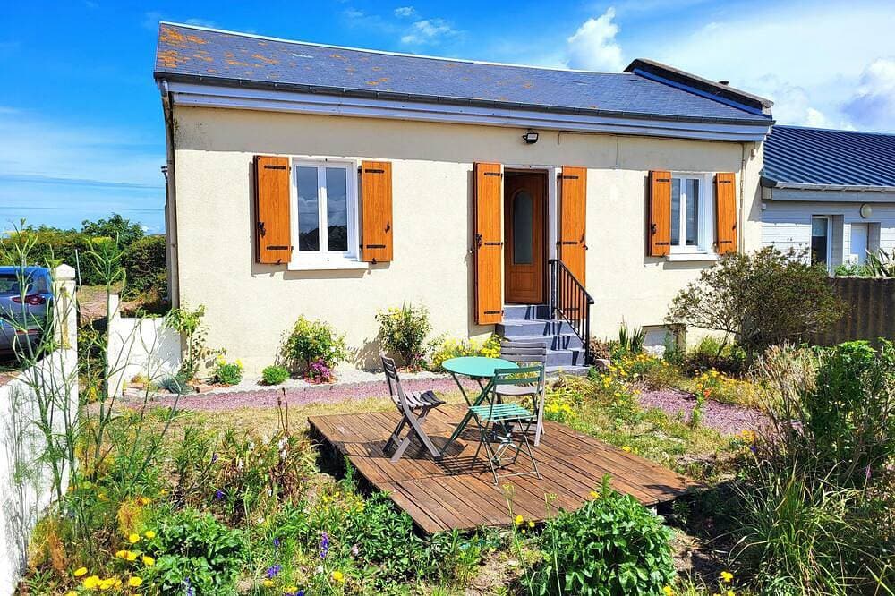 Ferienhaus „Seaside, Les Fleurs“ mit Gemeinschaftsterrasse, privatem Garten und WLAN 1