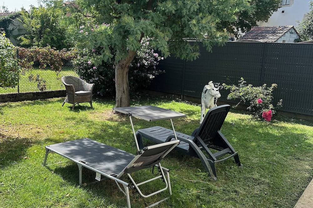 Foto 13 von 14: Small apartment with garden