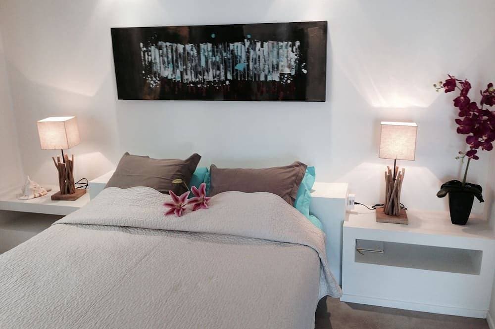 Foto 2 von 30: Perfekte Lage direkt am Strand – Luxuriöse 2 Zimmer im Souterrain mit direktem Zugang zum Meer.