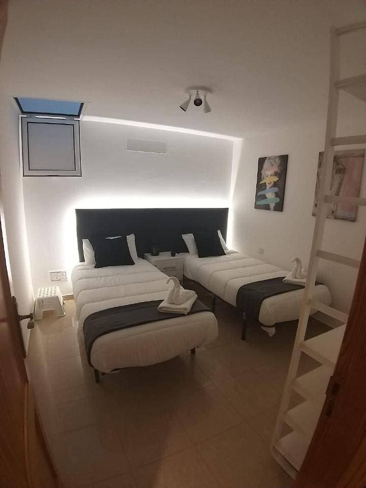 Foto 6 von 37: Three-Bedroom House