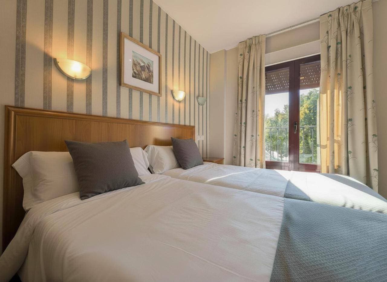 Foto 8 von 14: Double Room with Air  Conditioning and Private Bathroom