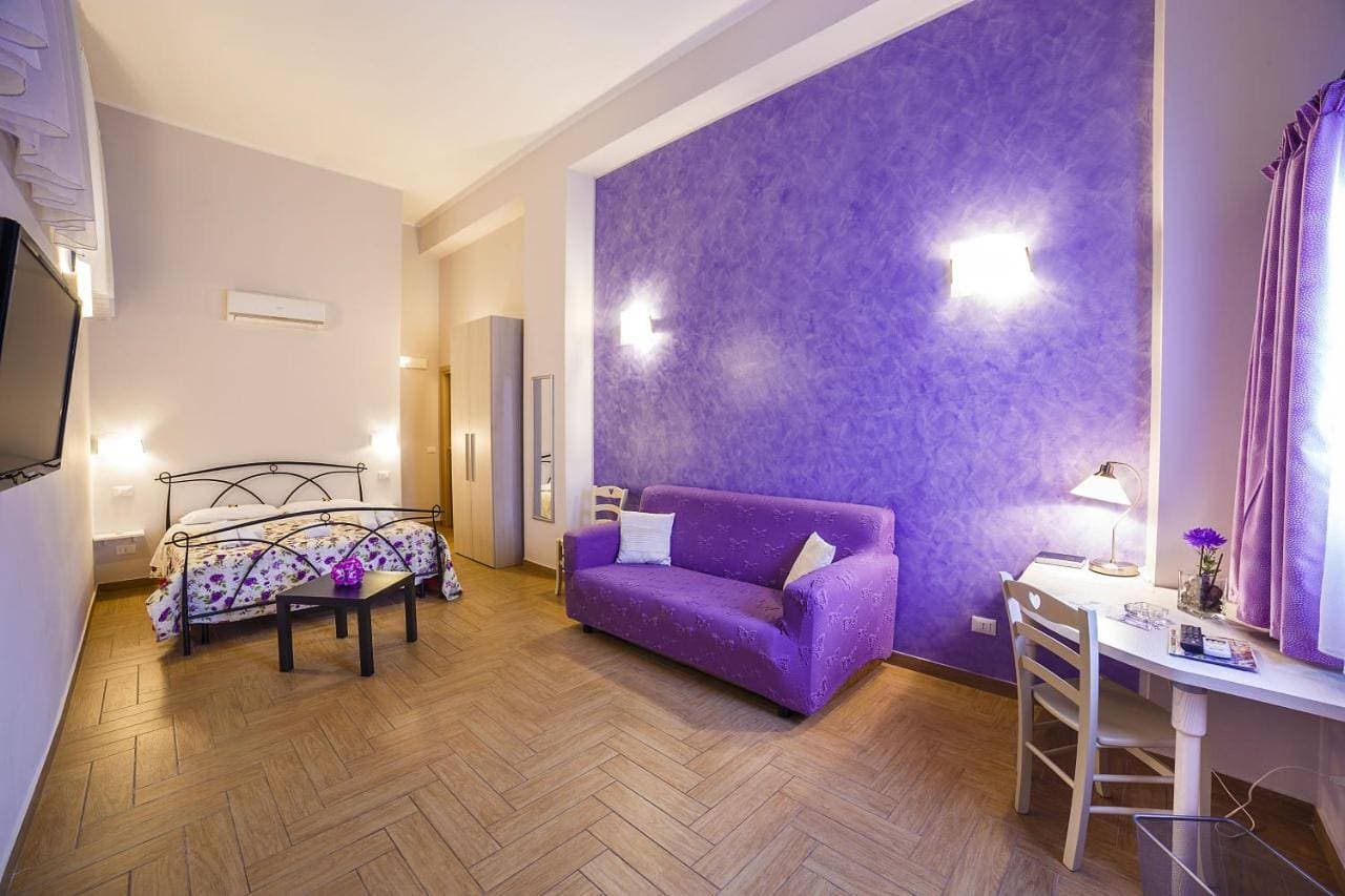 Foto 9 von 36: Classic Quadruple Room