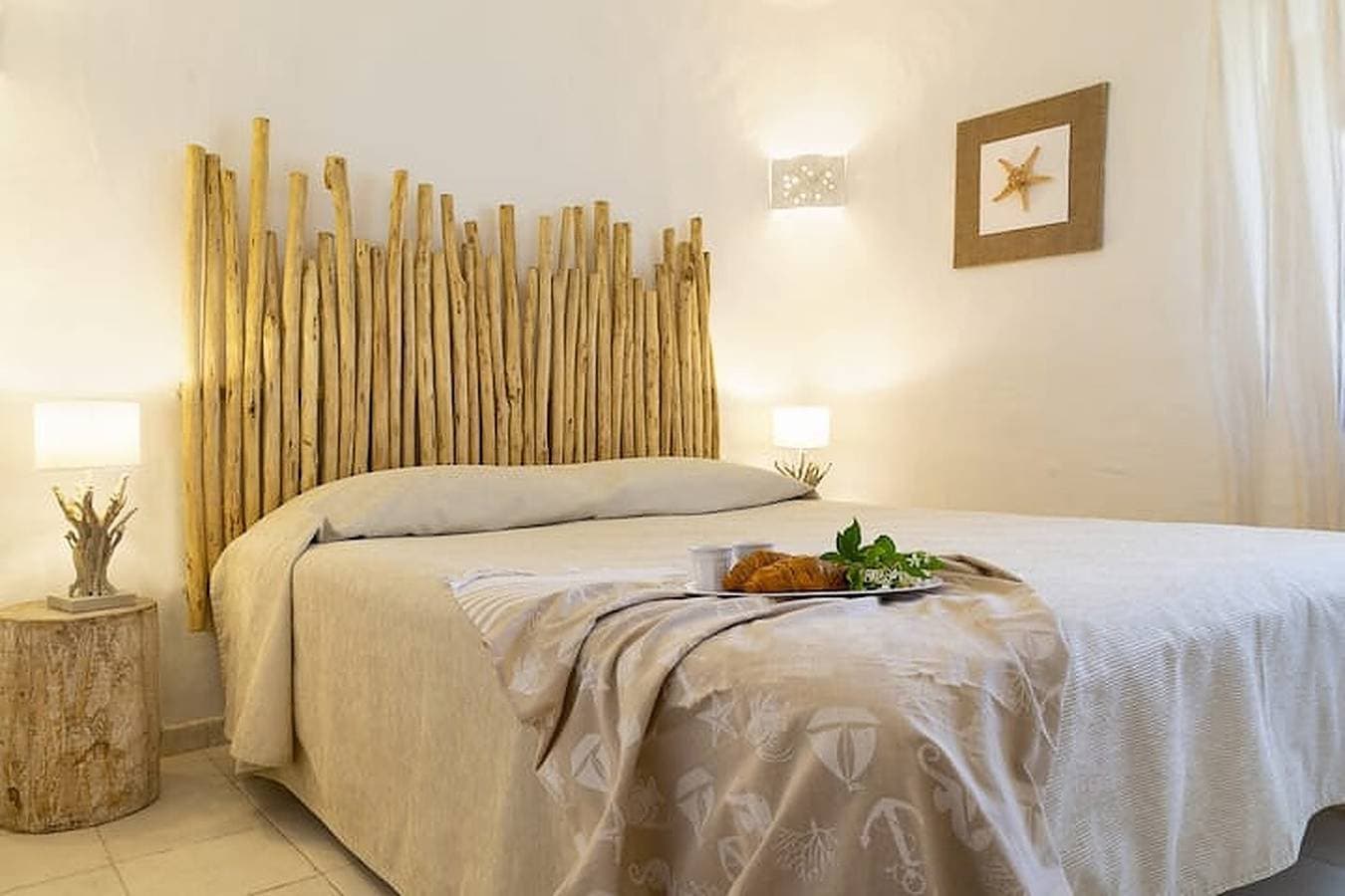 Foto 4 von 10: Ferienhaus "Casa giardino e spiaggia a piedi" in Strandnähe mit Garten & Terrasse