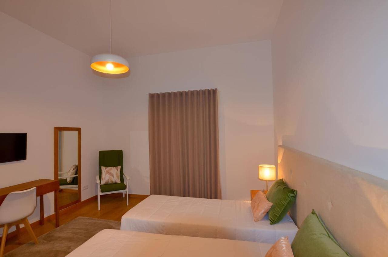 Foto 6 von 12: Double Room with Shared Bathroom
