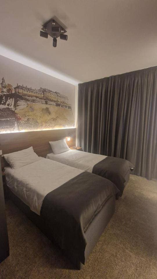 Foto 6 von 11: Standard Twin Room with Free Parking