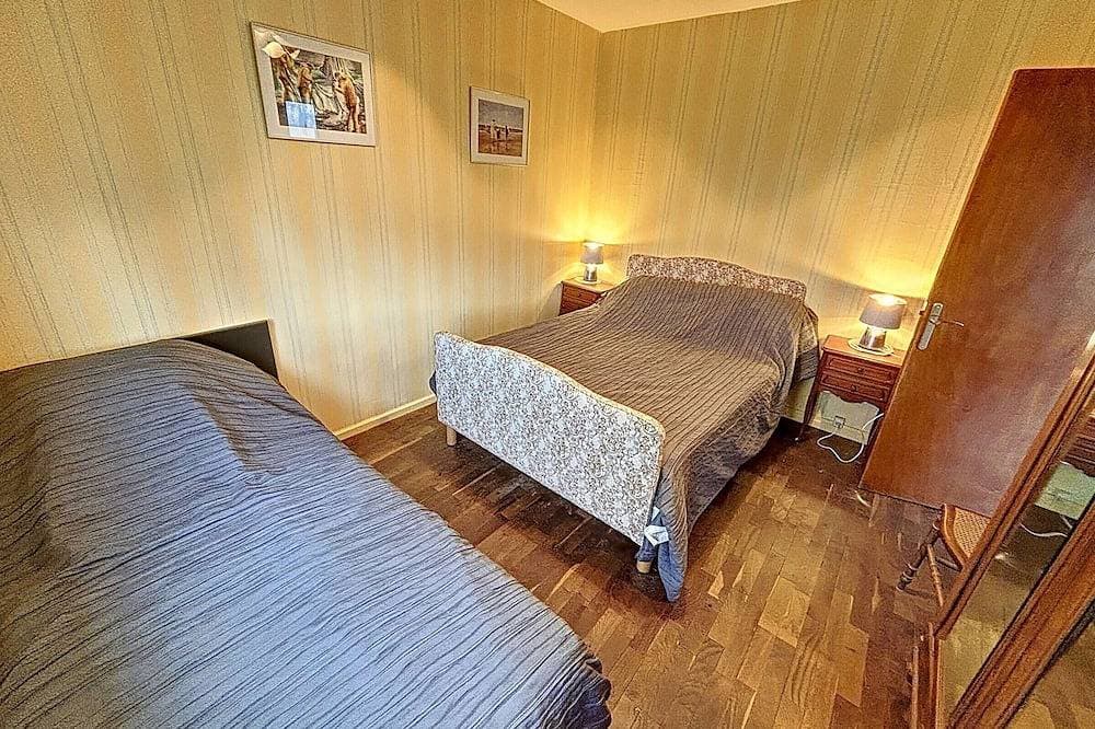 Foto 4 von 15: Ferienhaus mit Garten, nah am Strand, Haustierverbot, WLAN*, Bettwäsche optional