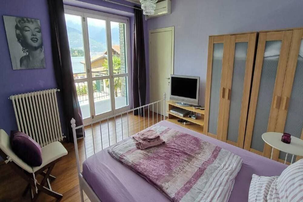 Foto 5 von 30: Elegant & Spacious Lakefront Retreat with Pool, Beach Access & Panoramic Views