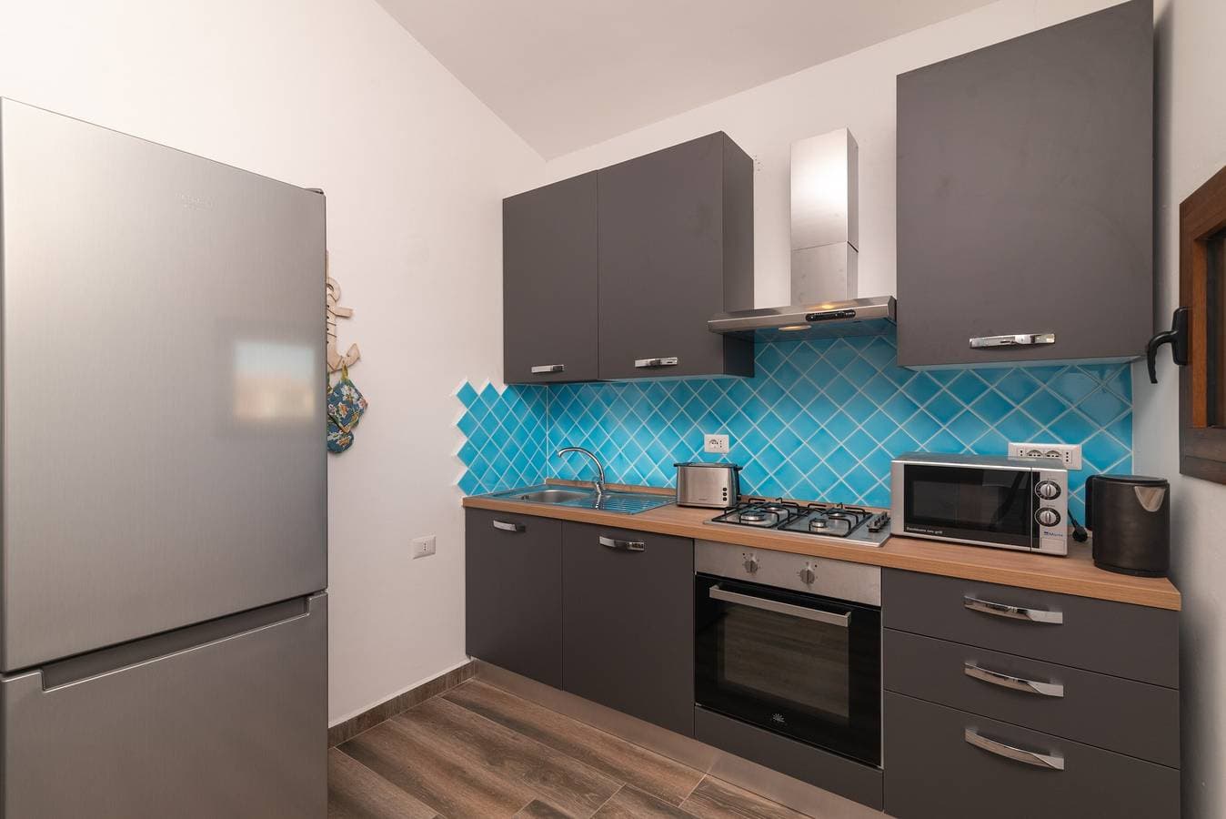 Foto 6 von 25: Ferienhaus 'Mavi Primo Piano' mit privater Terrasse, WLAN und Klimaanlage