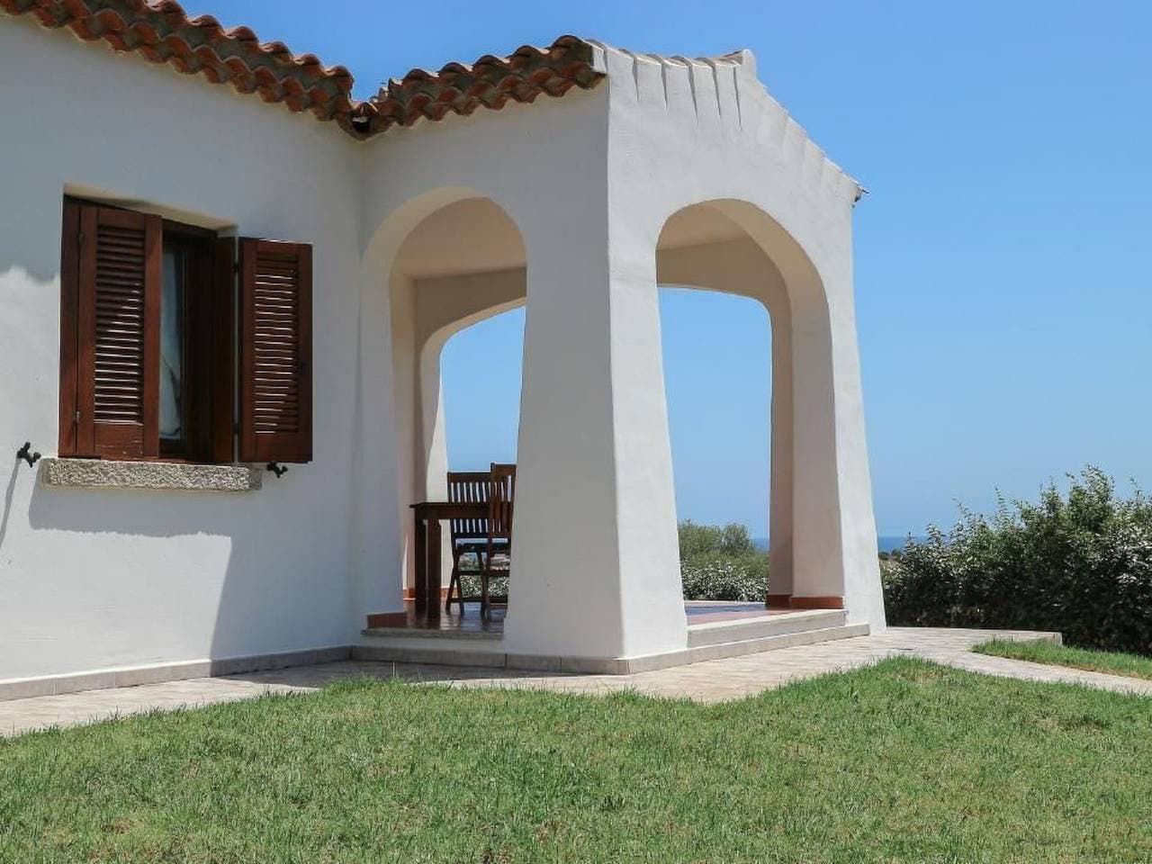 Foto 4 von 23: Villa mit gemeinsamem Pool und Meerblick