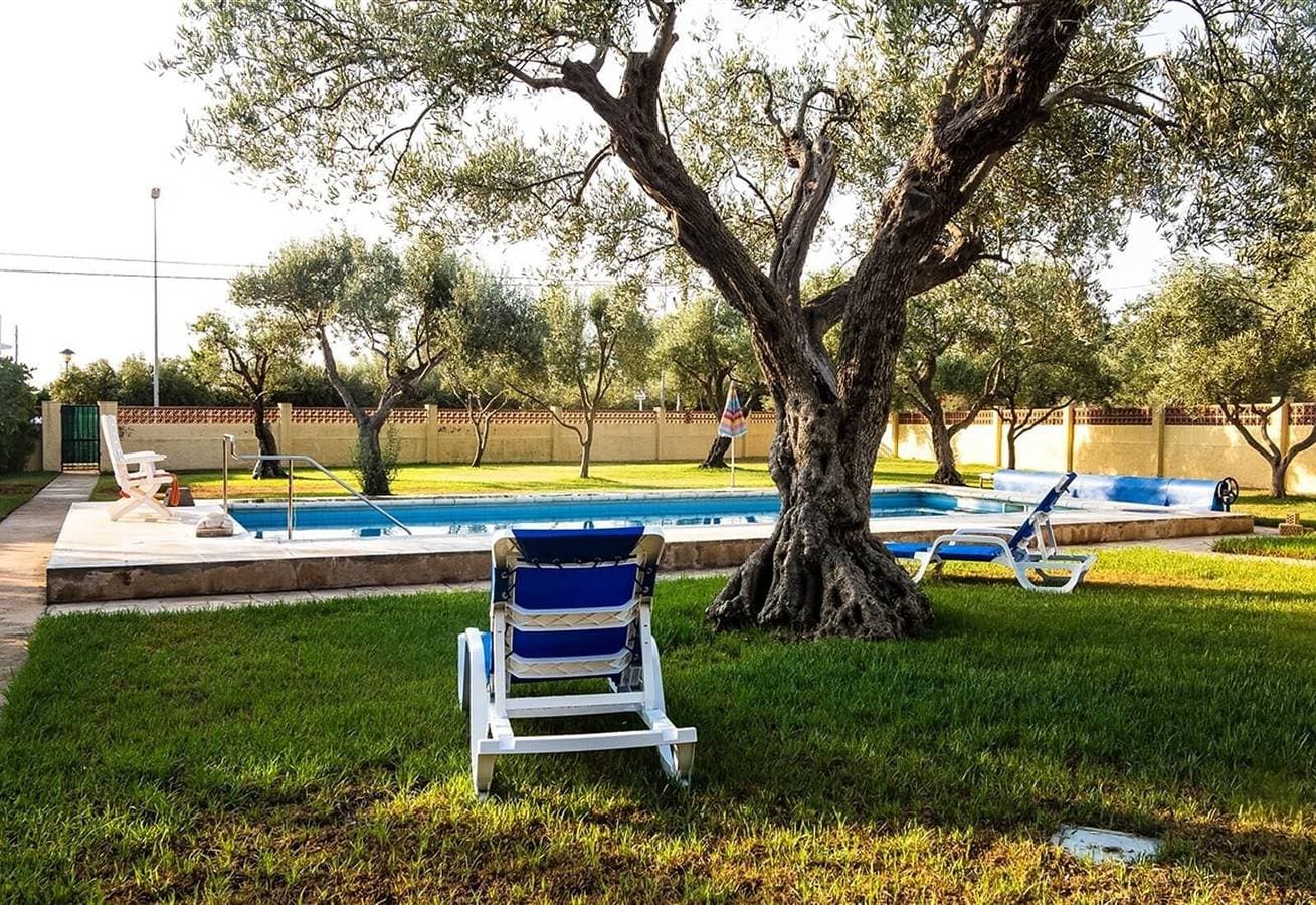Foto 11 von 44: Villa in direkter Strandnähe ,mit privatem beleuchtetem Pool, Garten, 2Terrassen, Grill und WLAN