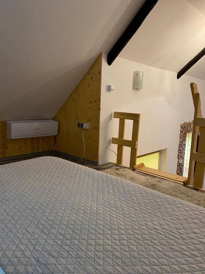 Foto 9 von 16: Triple Room with Private Bathroom