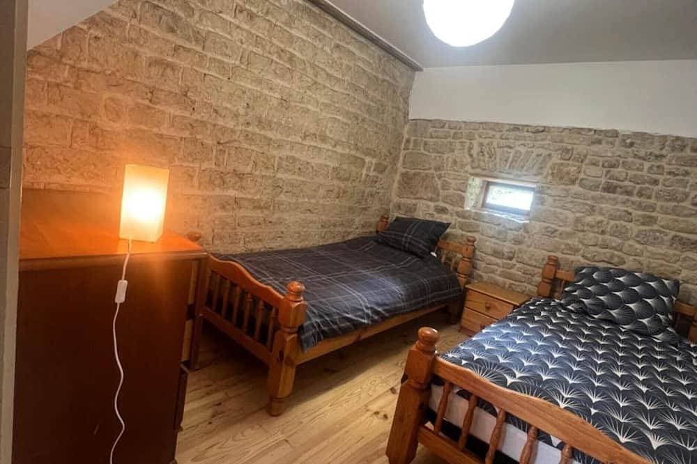 Foto 3 von 17: Apartment „Gîte 1“ mit gemeinsamer Terrasse, Garten und WLAN
