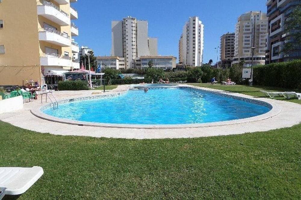 Bright holiday apartment with pool 1