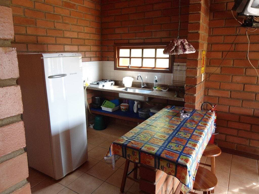 Foto 11 von 18: Canto das Águas Bungalows, Wasserfall mit natürlichem Pool