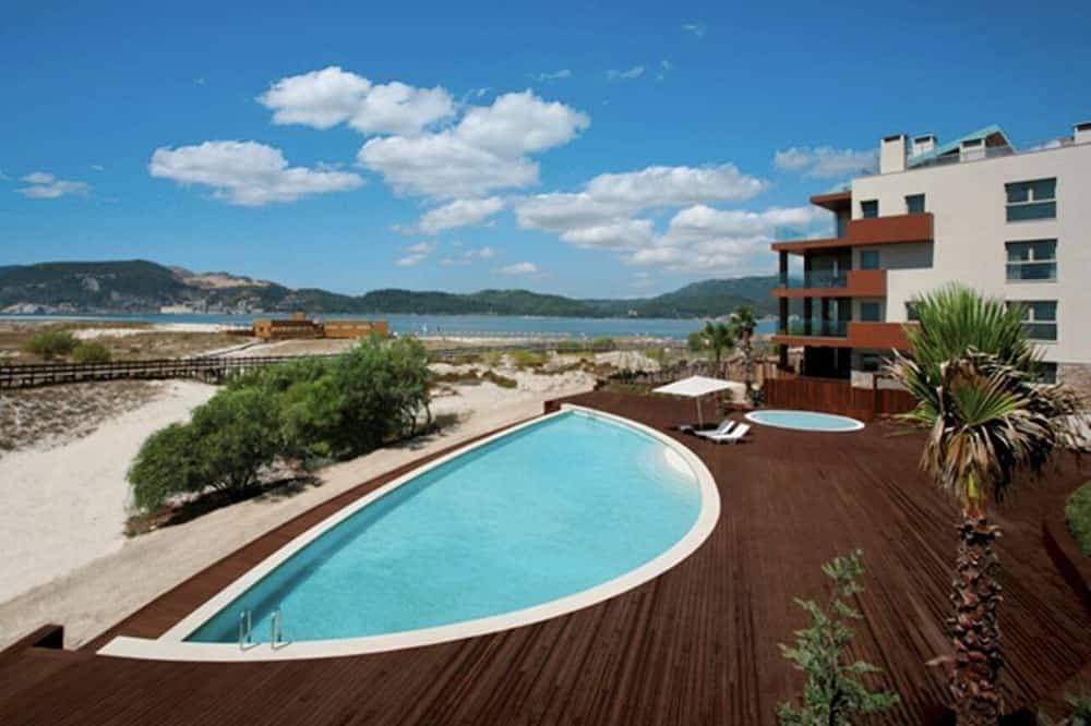 Apartment in Tróia on the beach in a condominium with swimming pool 1
