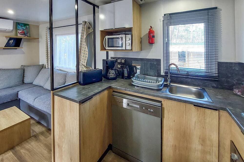 Foto 13 von 15: Beautiful (sta)caravan in Saint-Julien-en-Born