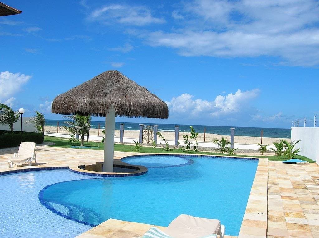 Foto 4 von 10: Schöne neue 1 Schlafzimmer Beachfront Condo On White Sand Beach