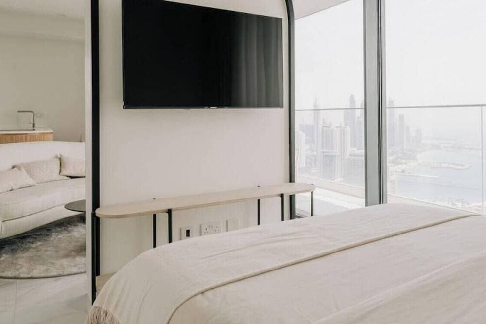Foto 2 von 30: Official Mercury Suites | Lux 1Br w/Pool & Gym
